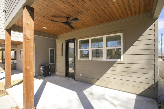 view of patio / terrace featuring ceiling fan and central AC