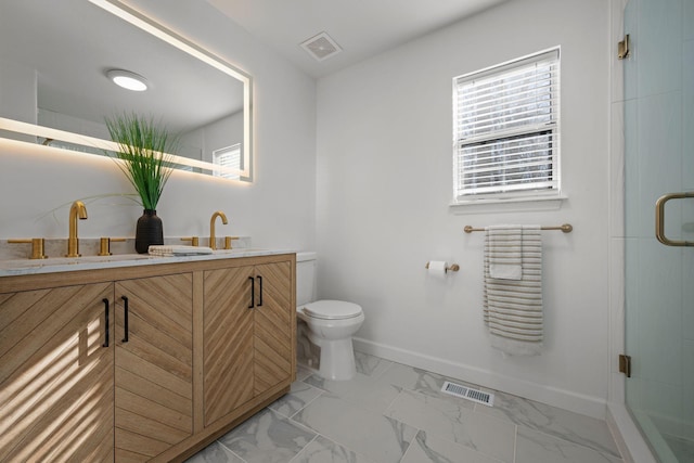 full bath featuring marble finish floor, visible vents, a sink, and a stall shower