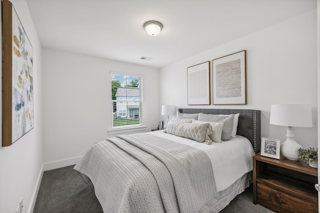 bedroom featuring carpet, visible vents, and baseboards