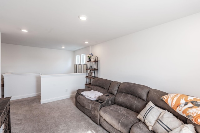 living room with baseboards, recessed lighting, and light colored carpet