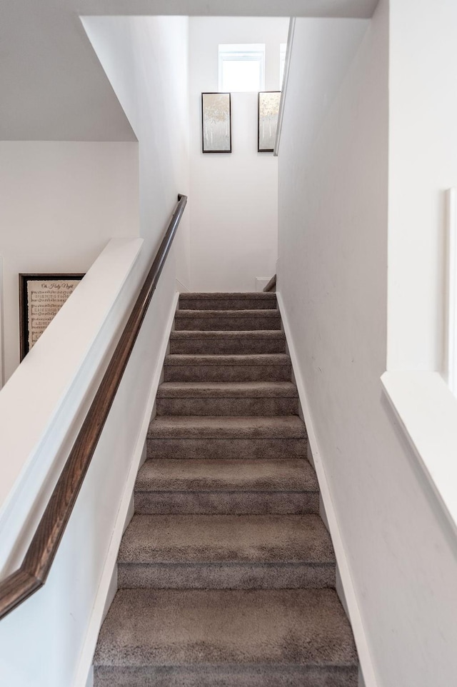 stairway with baseboards