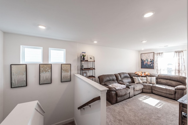 living room with carpet, plenty of natural light, and recessed lighting