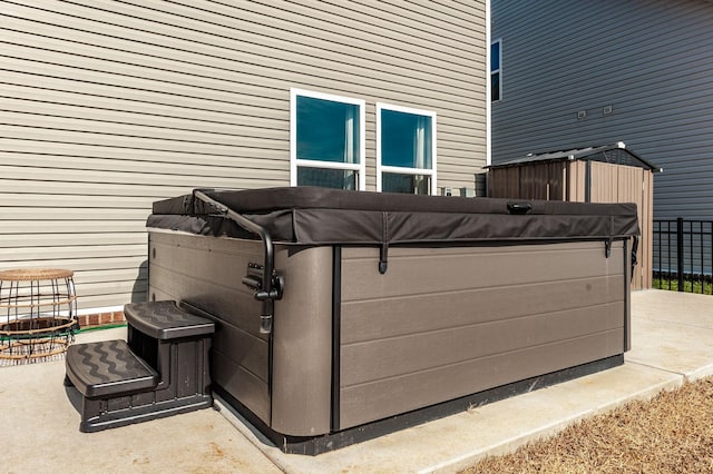 exterior space featuring a hot tub