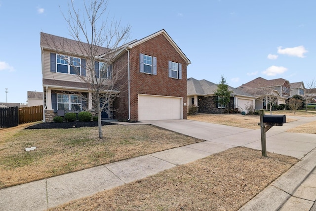 traditional-style home with a garage, brick siding, fence, concrete driveway, and a front yard