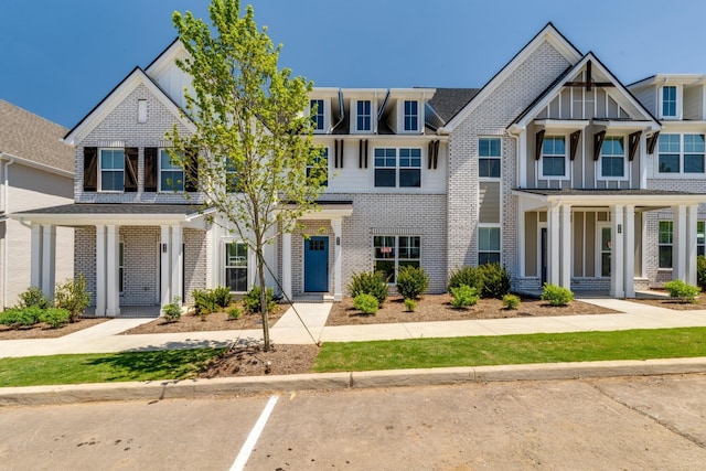 multi unit property featuring brick siding