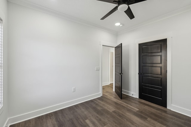 unfurnished bedroom featuring dark wood-style floors, recessed lighting, ornamental molding, ceiling fan, and baseboards