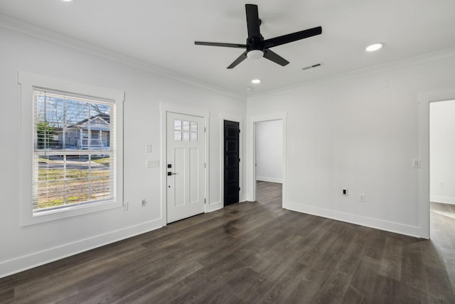 entrance foyer featuring baseboards, visible vents, and ornamental molding