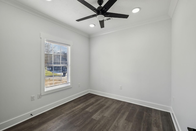 unfurnished room with baseboards, dark wood-style flooring, a ceiling fan, and crown molding