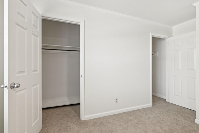 107 Sylvan Glen Ct, Nashville, TN 37209 - unfurnished bedroom featuring crown molding, a closet, baseboards, and carpet flooring