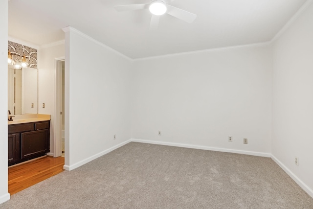 107 Sylvan Glen Ct, Nashville, TN 37209 - unfurnished bedroom with baseboards, ensuite bathroom, light colored carpet, and crown molding