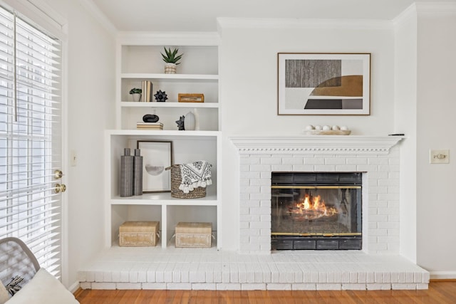 107 Sylvan Glen Ct, Nashville, TN 37209 - interior details featuring ornamental molding, a fireplace, built in features, and wood finished floors