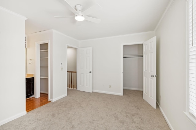 107 Sylvan Glen Ct, Nashville, TN 37209 - unfurnished bedroom with ornamental molding, a closet, carpet flooring, and a walk in closet