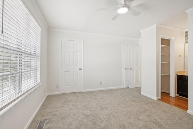 107 Sylvan Glen Ct, Nashville, TN 37209 - unfurnished bedroom featuring light colored carpet, a ceiling fan, baseboards, visible vents, and ornamental molding