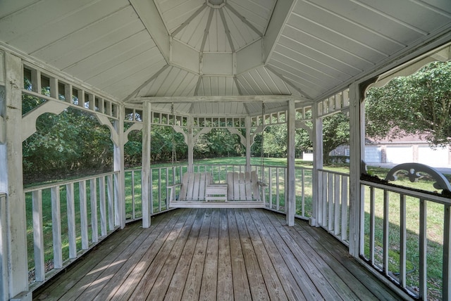 deck with a gazebo and a yard