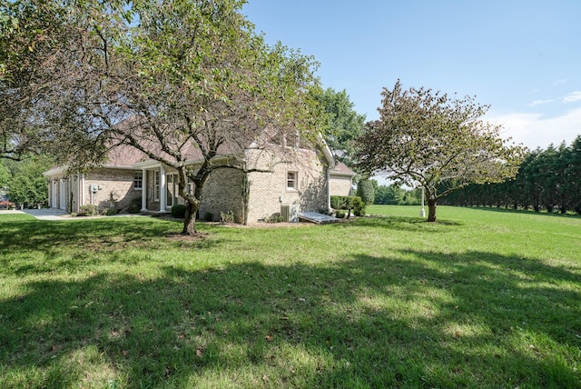 view of yard featuring a garage
