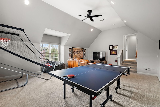 recreation room featuring visible vents, carpet flooring, vaulted ceiling, ceiling fan, and baseboards