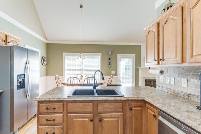 kitchen with dishwashing machine, a sink, vaulted ceiling, light countertops, and stainless steel fridge with ice dispenser