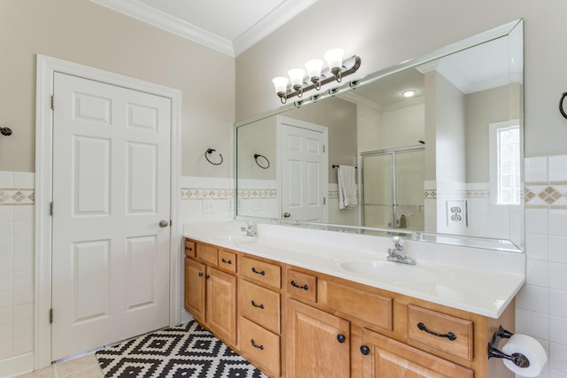 full bathroom with ornamental molding, a stall shower, and tile walls