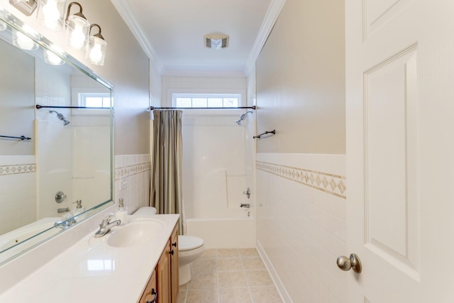 full bath featuring toilet, ornamental molding, and tile walls