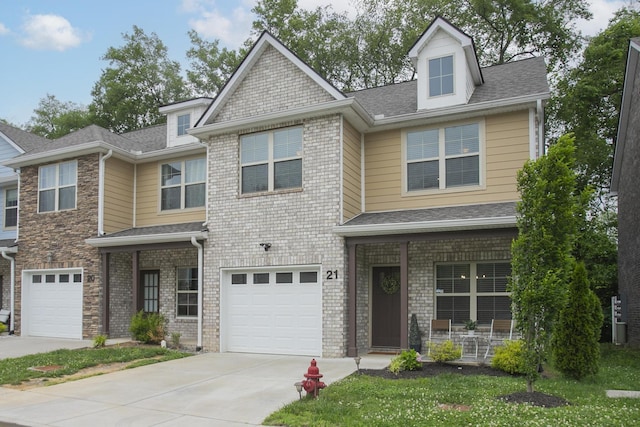 view of front of property with a garage, brick siding, driveway, and roof with shingles