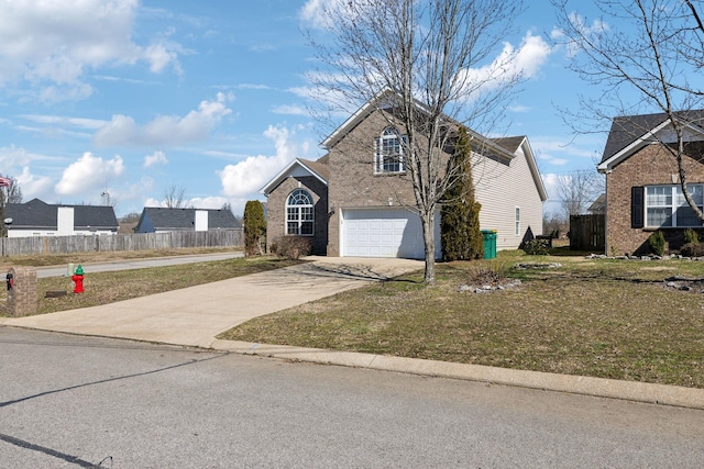 traditional home with driveway, an attached garage, fence, and brick siding