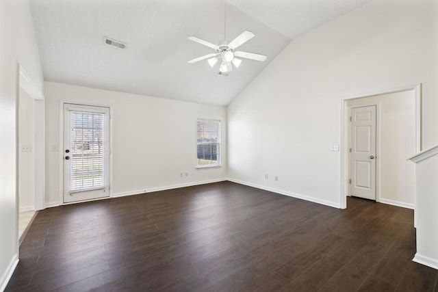 unfurnished room featuring dark wood-style floors, ceiling fan, visible vents, and baseboards