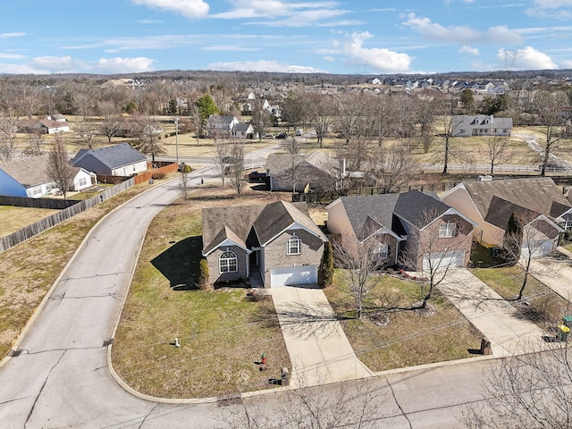 birds eye view of property with a residential view