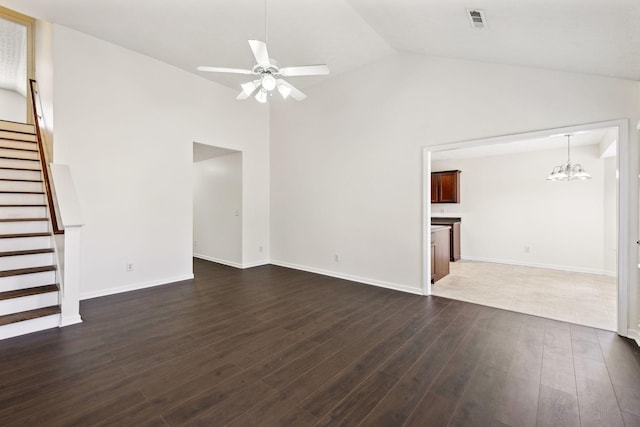 unfurnished living room with stairway, dark wood-style floors, visible vents, and ceiling fan with notable chandelier