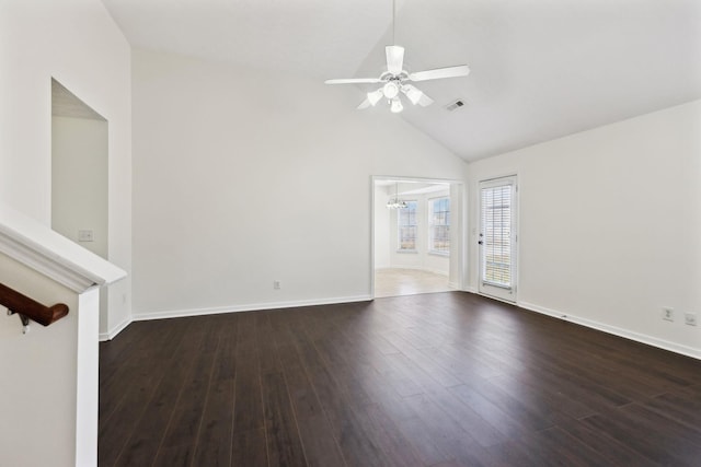 unfurnished room featuring dark wood-style flooring, visible vents, vaulted ceiling, ceiling fan, and baseboards