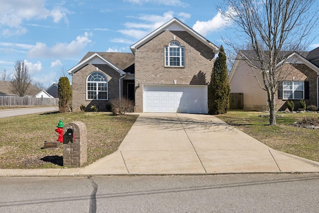 traditional-style home featuring an attached garage, brick siding, fence, concrete driveway, and a front lawn