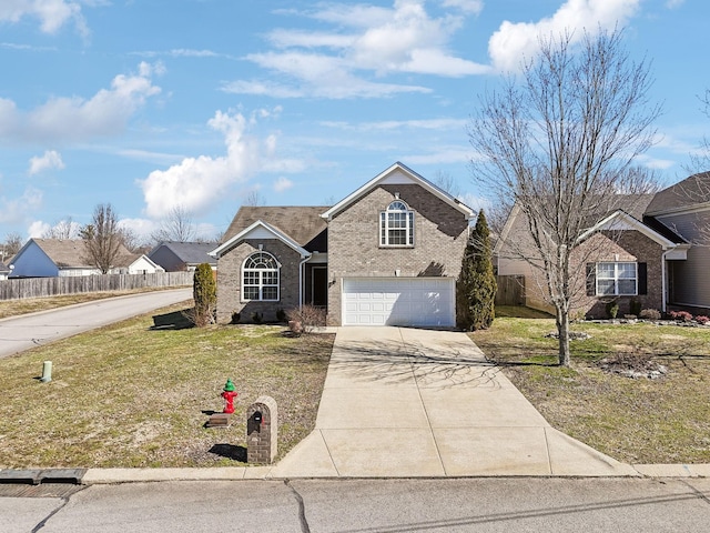 traditional home featuring a garage, brick siding, fence, concrete driveway, and a front yard