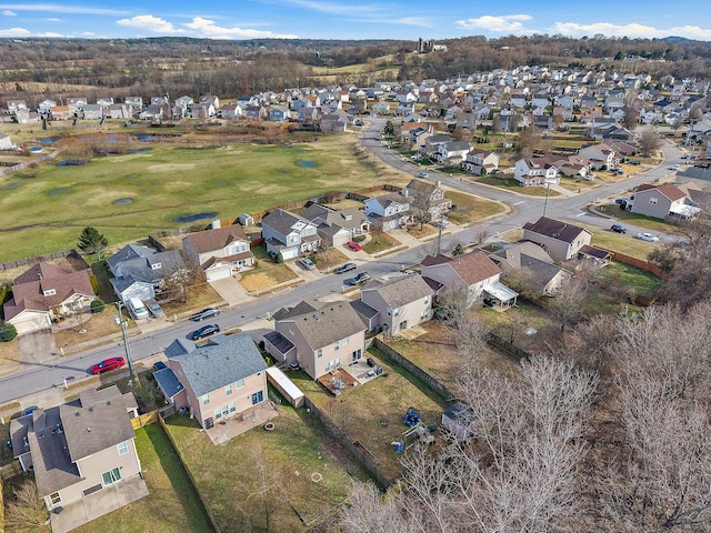 birds eye view of property with a residential view