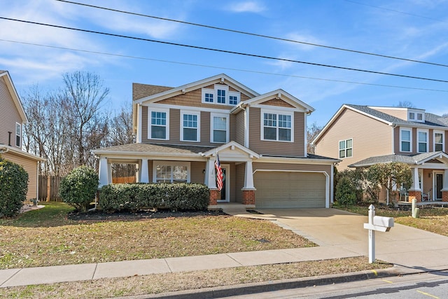 view of front of property with driveway and a garage