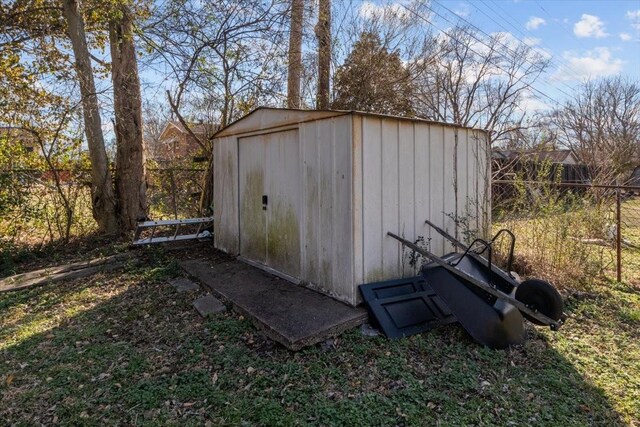 view of shed featuring a fenced backyard