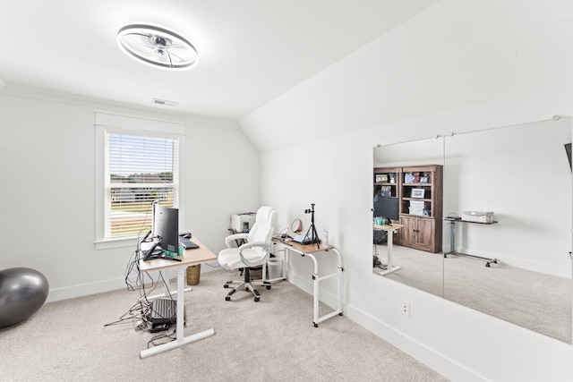 office space with lofted ceiling, carpet flooring, visible vents, and baseboards