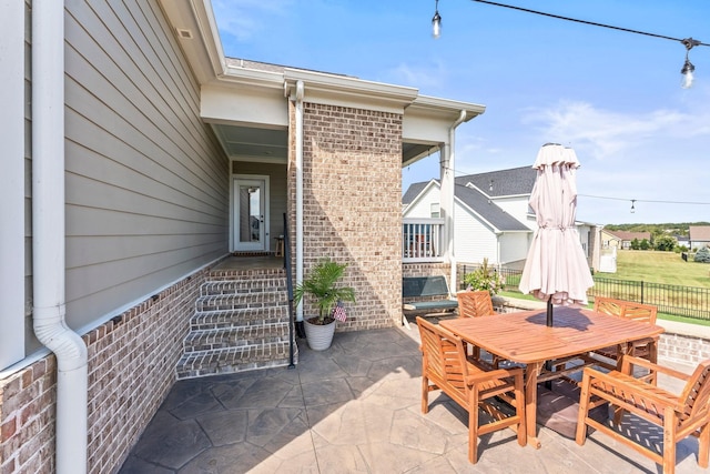 view of patio / terrace with fence and outdoor dining area