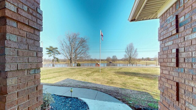 view of yard with a water view