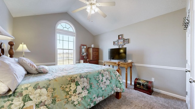 bedroom featuring lofted ceiling, ceiling fan, carpet flooring, and baseboards