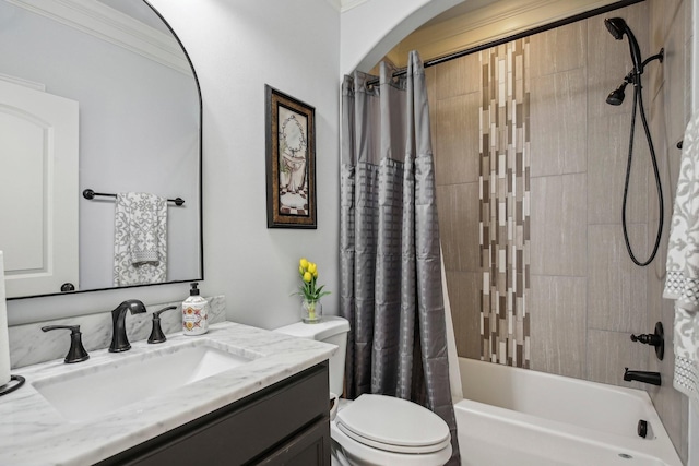 bathroom with toilet, ornamental molding, shower / bath combination with curtain, and vanity