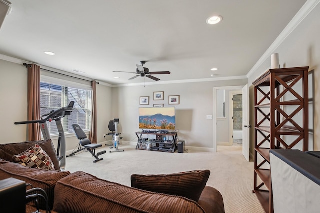 interior space with baseboards, a ceiling fan, ornamental molding, carpet floors, and recessed lighting