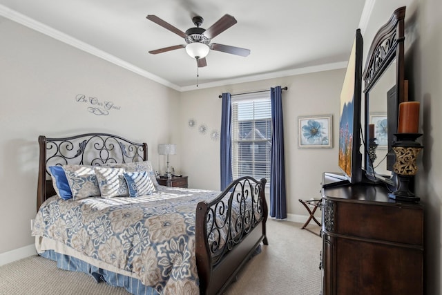 bedroom with baseboards, carpet floors, and crown molding