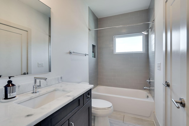 full bathroom featuring toilet, vanity, shower / tub combination, and tile patterned floors