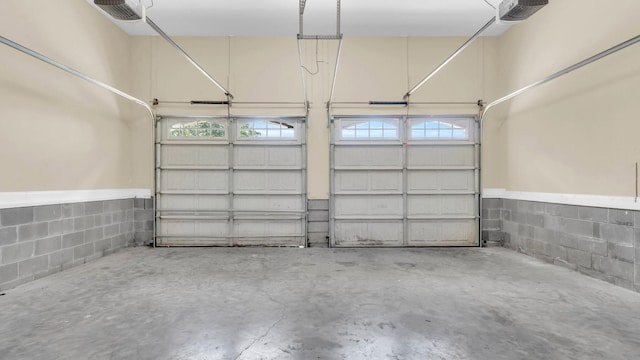 1108 City View Ter, Chattanooga, TN 37421 - garage featuring concrete block wall and a garage door opener