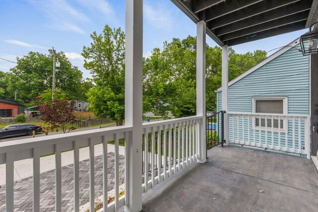 balcony featuring a porch