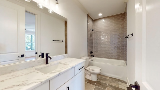 full bath with bathing tub / shower combination, vanity, and toilet