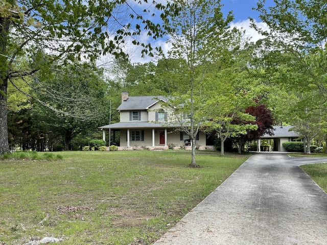 830 Motlow College Rd, Normandy, TN 37360 - view of front of property with a front lawn, driveway, covered porch, and a chimney