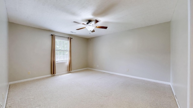 830 Motlow College Rd, Normandy, TN 37360 - spare room with ceiling fan, light carpet, and a textured ceiling