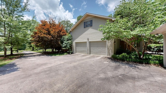 830 Motlow College Rd, Normandy, TN 37360 - view of home's exterior with a garage and driveway