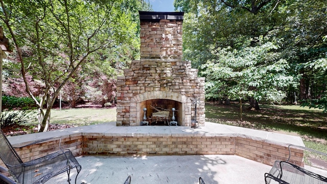 830 Motlow College Rd, Normandy, TN 37360 - view of patio / terrace featuring an outdoor stone fireplace