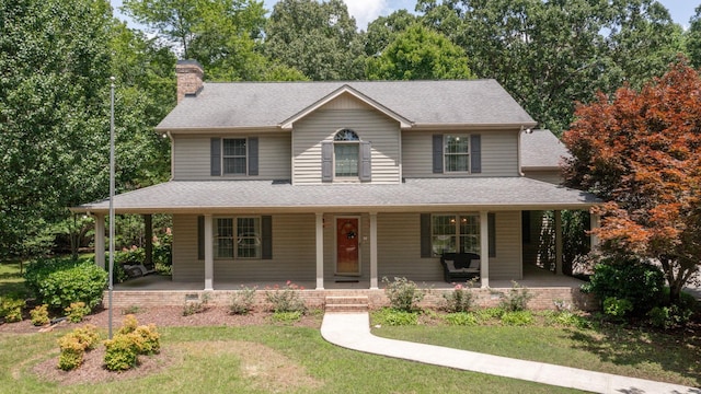 830 Motlow College Rd, Normandy, TN 37360 - farmhouse-style home featuring covered porch, a chimney, a front lawn, and roof with shingles